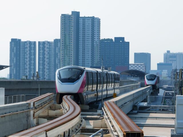 MRT pink line new train in Bangkok at Nonthaburi Civic Center station with signs , Information board
