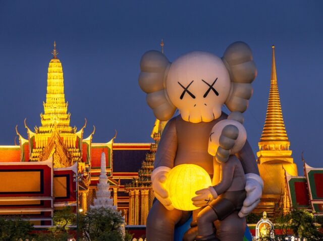 Bangkok, Thailand-May 18,2025 : 18-meter-high inflatable art sculpture "COMPANION“ titled "KAWS: